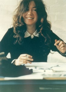 Lynn Breeze at desk in studios